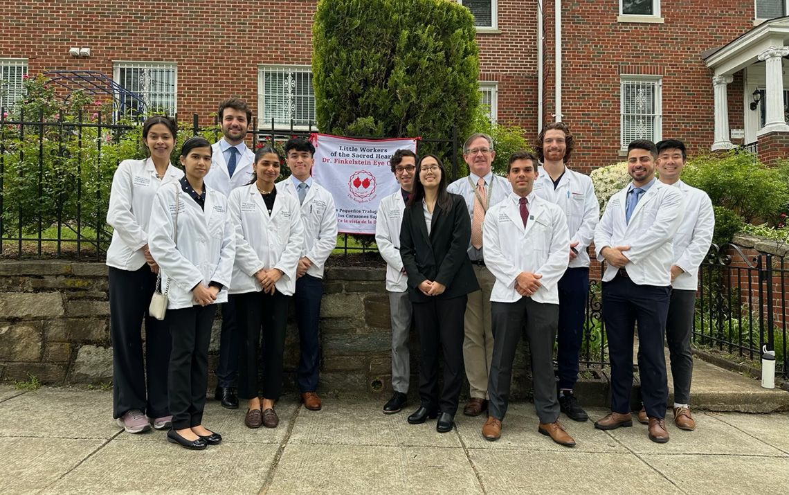 Group gathered in front of GW Medicine